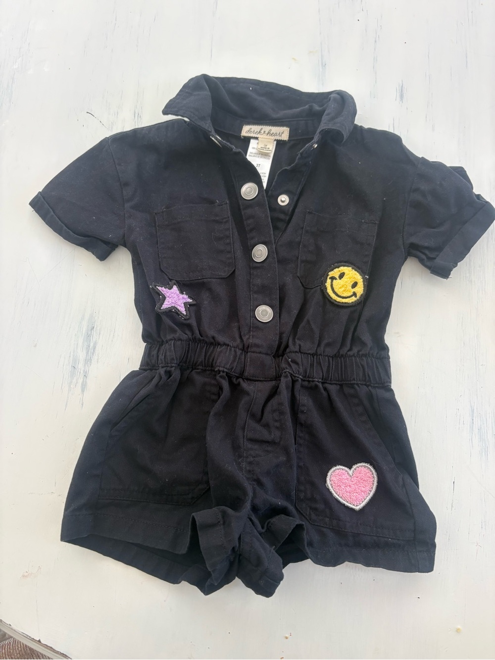 Derek Heart Black Short Sleeve Patch Romper with Smiley